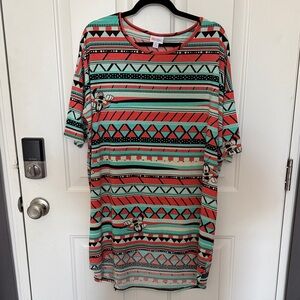 LuLaRoe Disney Geometric Patterned Irma Shirt in Coral and Mint Green